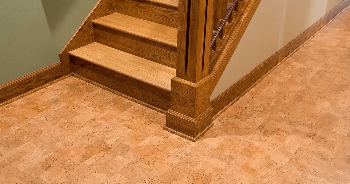 End of a staircase with cork flooring in Knoxville, TN